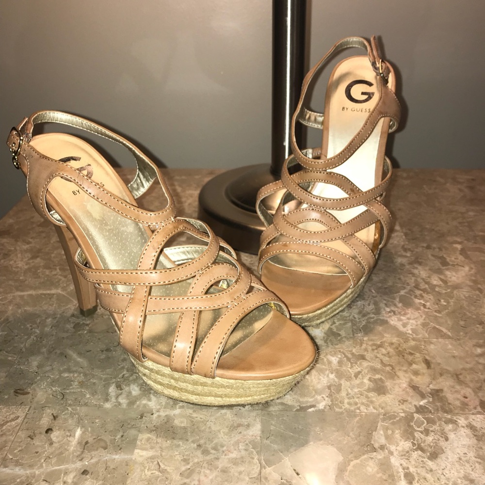 Guess platform strappy heel sandals.